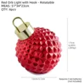 Red decorative Christmas ball light with gold top, textured surface, holiday home decor. - Rotating Red Lighted Ball