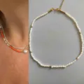 Collana girocollo di perle d'acqua dolce fatte a mano stile bohémien con perline dorate donna. - Stile Perla