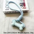 Blue dog chew toy with spiked rubber bone and durable braided cotton rope for molar cleaning. - 130g Single Pack / Blue Hand-Pulled Bone Knot