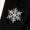 Elegant crystal snowflake brooch pin, sparkling rhinestone metal badge for winter apparel. - Silver Snowflake Style (2013)