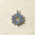 Silver-tone blue crystal snowflake pendant necklace accessory, elegant sparkling floral design. - Snowflake Pendant Only (Without Chain)