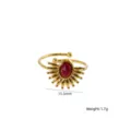 Gold open ring with red stone and sunburst design, stylish bohemian jewelry accessory. - Red Agate