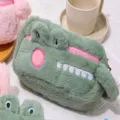 Cute green crocodile plush pencil case, soft fuzzy cartoon stationery pouch for school kids. - Handheld Green Crocodile