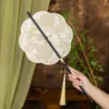 Traditional Chinese style round fan with bamboo handle and elegant tassel for Hanfu costume. - 8-Petal Oriole Butterfly-Yellow Waist Fan (Bamboo Edge)