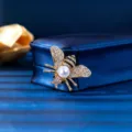Cute bee brooch pin with rhinestones and pearl, alloy insect badge for clothes and bags. - Golden Pearl Bee (XD8662-3) / Gold, White