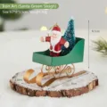 Christmas iron Santa Claus green sleigh ornament with mini tree on rustic wood base 9.7x8cm - Iron Green Sled Santa Claus