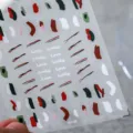 Adesivi per unghie natalizi retrò, design a pennello color crema con lettere carine. - Blocchi di Colore Rosso Verde Piatti (KX169)