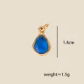 Exquisite teardrop blue cubic zirconia pendant, gold-toned setting, elegant DIY jewelry charm. - December Teardrop