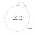 Elegant gold-tone chain necklace featuring delicate pearls and metal beads for women stylish jewelry. - Pearl-Style Link Chain