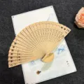Wooden hollow folding fan Chinese style carved gift hand fan for wedding party favors - Snowflake Hollow Style
