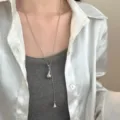 Silver lariat long necklace with adjustable pull design and elegant droplet pendants. - Double Water Drop Necklace / Silver