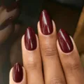 Short almond press-on nails in dark red glitter. Handmade fake nail tips for daily wear. - Hawthorn Red (DXR23#)