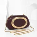 Burgundy clutch bag with gold chain strap and metal handle, elegant evening party shoulder bag. - Burgundy