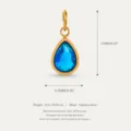 Elegante ciondolo a goccia in acciaio inossidabile dorato con cristallo blu e precise misure. - Settembre