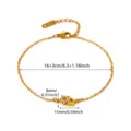 Vista detallada de pulsera estrella de acero dorado con medidas exactas y circonitas. - Estrella de Strass Dorada (G122320-t)