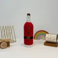 Copertura per bottiglia di vino Babbo Natale lavorata a maglia festa decorazione - Rosso