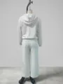 Detailed view of the grey hooded zip-up sweatshirt and wide-leg trousers casual suit back display. - Back View