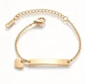 Goldfarbenes Edelstahl ID Armband mit Herz Anhänger und gebogenem Gravur Plättchen. - Herz Blanko-Rohr Armband / Gold