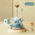Multifunctional cat toy with track ball, spring teaser, and treat dispenser in peacock blue. - Blue Turtle Cat Turntable