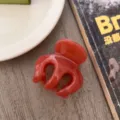 Circa 5,5 cm / arancio-rosso