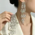 Heavy Craft Long Tassel Stud Earrings