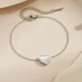 Weiße Muschel Herz Armband / Stahlfarben