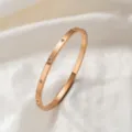 Zehn Diamanten Armreif (Z302) / 4mm Breite / Roségold