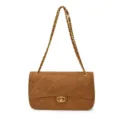 Brown faux suede quilted shoulder bag with gold chain strap and front turn-lock clasp - Brown