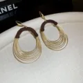 Ovale Wikkeling Oorhaken / Goud