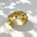 Bracciale rigido / Larghezza 26mm / Oro Blu