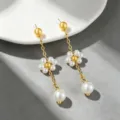 Orecchini a Pollice Fiore Singolo / Oro