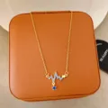 Gold with Blue Rhinestone (T152 Blue)