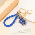Blue Gold Painted Horse Pendant with Braided Rope / Blue