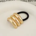 Oro KC de Arco de Triple Capa