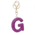 Buchstabe G / Lila Strass