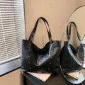 Large black faux leather tote bag with twin shoulder straps and metallic stud detailing - No Pendant / Black