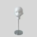 White foam mannequin head on a slim metal stand with a round metal base against gray - 1/3 Size Mannequin Head (Without Stand) / Approx 22cm