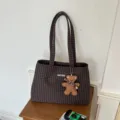 Brown checked fabric tote bag with twin handles and a plush teddy bear charm, shown upright - 36x15x25cm Without Pendant / Coffee