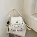 White polka-dot backpack with a heart-shaped clasp, drawstring closure and adjustable straps - No Pendant / 22*10*18 / White