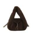 Front view of a brown plush bag with a leather tie, metal hardware, and an adjustable shoulder strap - With Pendant / Brown