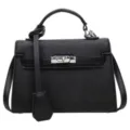 Black pebbled faux leather handbag with silver turn-lock, top handle and detachable shoulder strap - Black