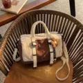 Beige and brown color-block tote crossbody bag with a cream strap and knitted flower charm - With Pendant / Brown