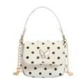 Small white faux-leather handbag with black polka dots, pink butterfly clasp and gold chain strap - White