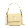 Yellow mini handbag with white polka dots, butterfly clasp, top handle and gold chain strap - Yellow