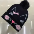 Black children's knitted beanie with pink and gray geometric jacquard, folded cuff and pom-pom - One Size (3-8 Years) / Cat Black