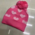 Pink children's knitted beanie with pale heart jacquard, folded cuff and matching pom-pom - One Size (3-8 Years) / Heart Dark Pink