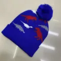 Blue children's knit beanie with folded cuff, pom-pom and colorful jacquard dinosaur pattern - One Size (3-8 Years) / Dino Royal Blue