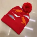 Red children's knit beanie with dinosaur jacquard, folded ribbed cuff and matching pom-pom - One Size (3-8 Years) / Dino Red