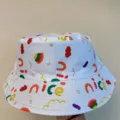 Close-up of a white bucket hat covered in colorful pasta prints and playful “nice” lettering - M (56-58cm) / White Colorful Printed Style (15)