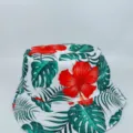 White bucket hat on a plain backdrop, featuring green tropical leaves and a bold red hibiscus - M (56-58cm) / White Base Tropical Red Flower Style (37)